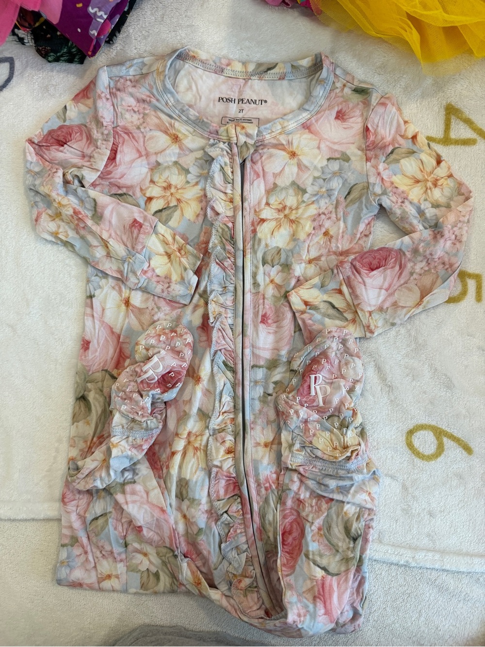 NWOT Posh Peanut flora footed footies 2T